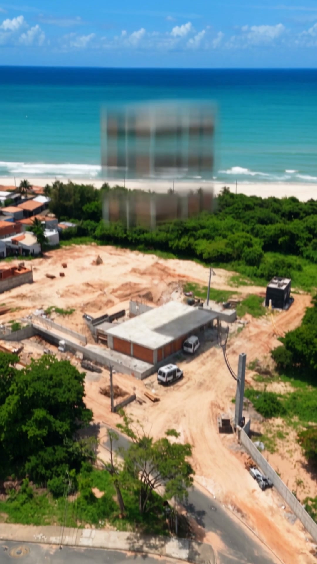 Imagem inicial · Prédio montando sozinho na praia
